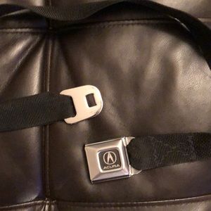 Adjustable Acura seatbelt belt. Never been worn.